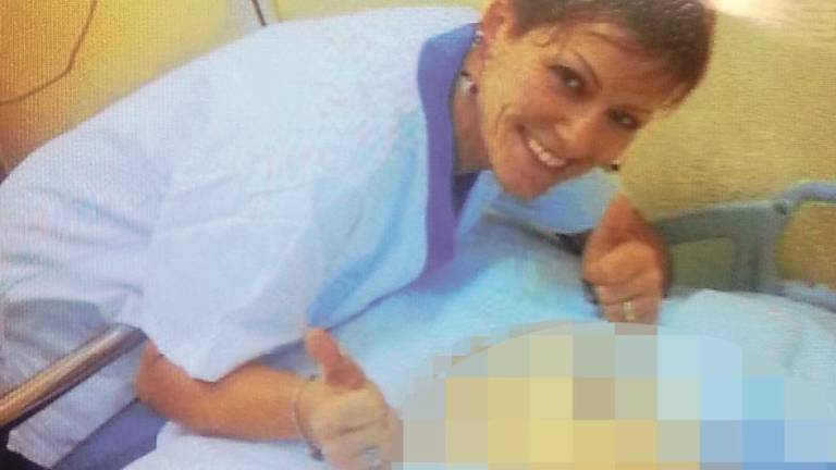 Ecco le foto choc dell'infermiera Ecco le foto choc dell'infermiera