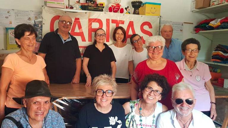 I volontari della Caritas I volontari della Caritas