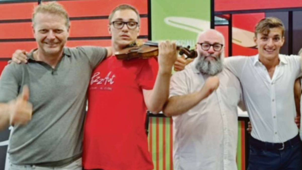 Rimini, si è rotto il violino, non posso suonare al Meeting: giovane autistico soccorso dal campione di atletica Luca Venturelli