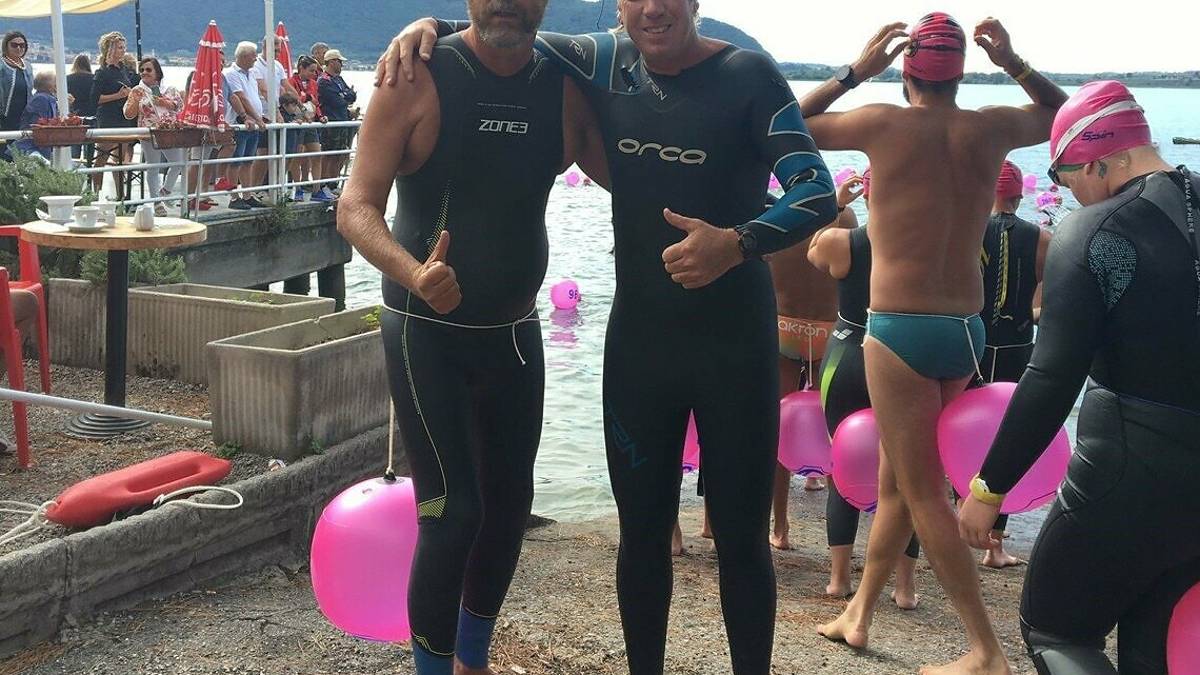 L'impresa del riccionese Lucarelli: il super-nuotatore tetraplegico conquista il Lago d'Iseo