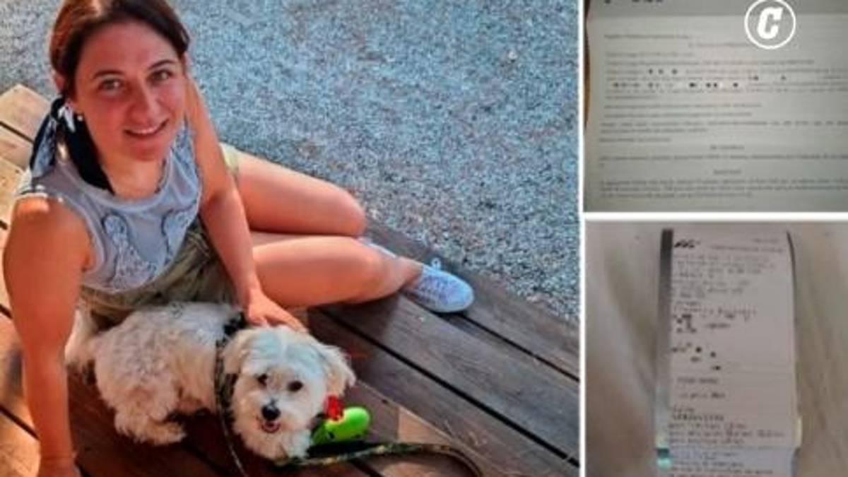 Eleonora Berretti con il cane e i documenti relativi alla sua vicenda (Foto tratta dal Corriere della Sera)