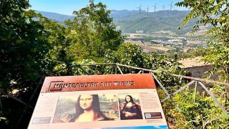Una simulazione del panorama della valle con il parco eolico in lontananza