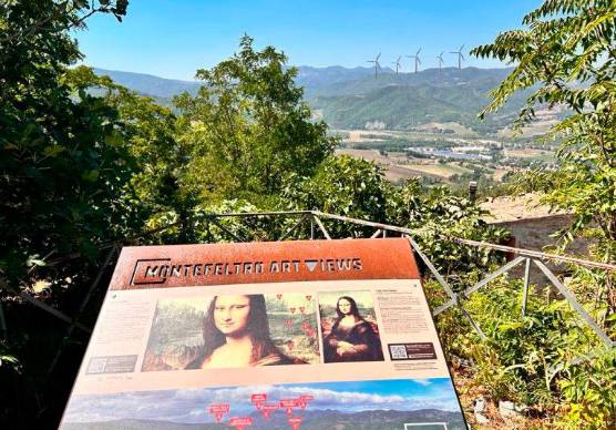 Una simulazione del panorama della valle con il parco eolico in lontananza
