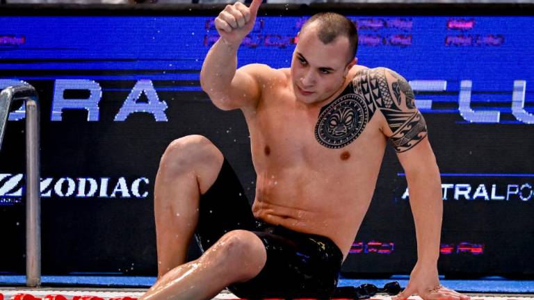 Sopra la staffetta mista maschile oro a Lublino con Cerasuolo 2° da sinistra